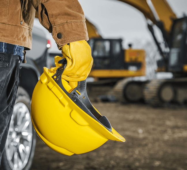Person holding hardhat